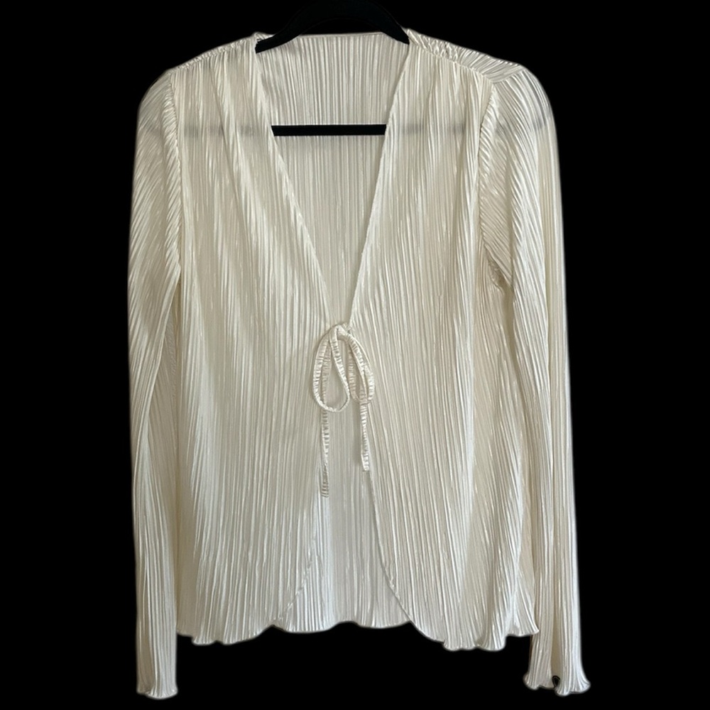 Women’s pleated tie-front cardigan & bell sleeves.